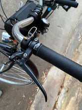 Load image into Gallery viewer, Left grip of handlebar from city commuter bicycle