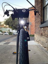 Load image into Gallery viewer, city commuter front view with lamp shining