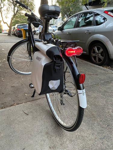 non-drive side rear view of city commuter